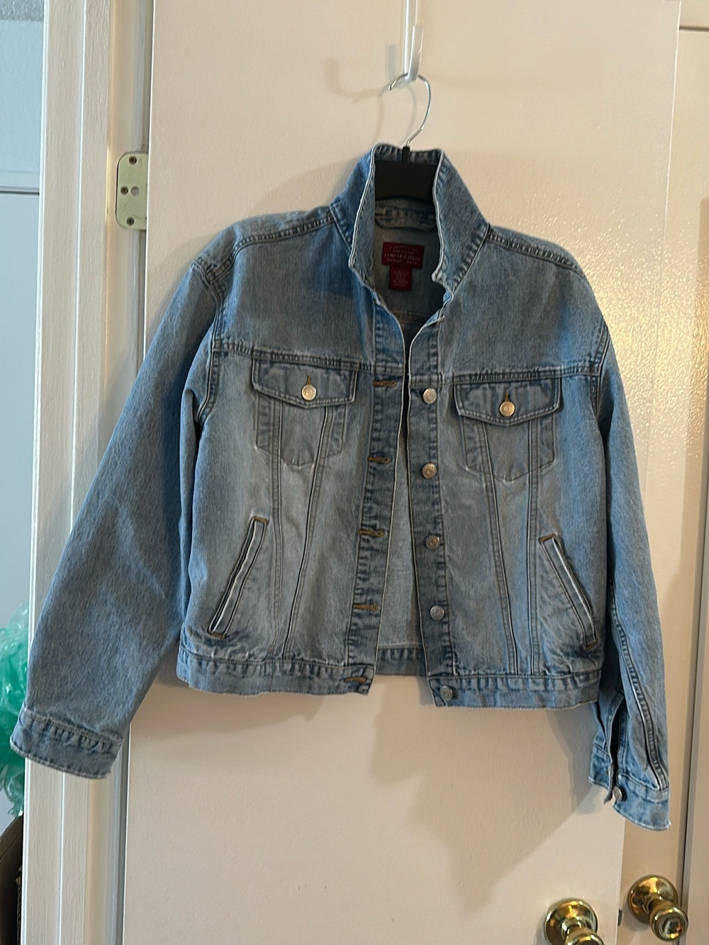 The Limited Light Blue Denim Jacket with Red Brand Tag